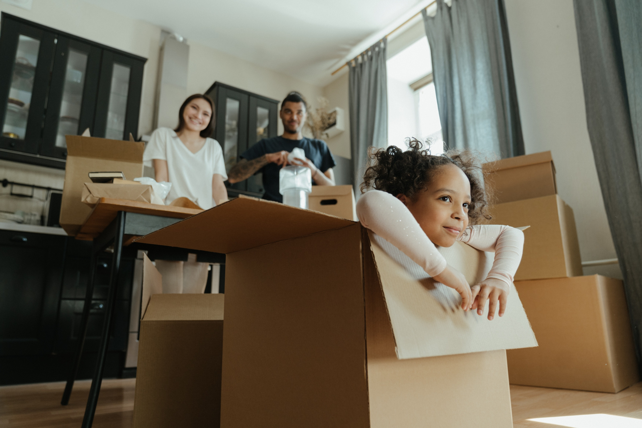 Multiracial family moving in