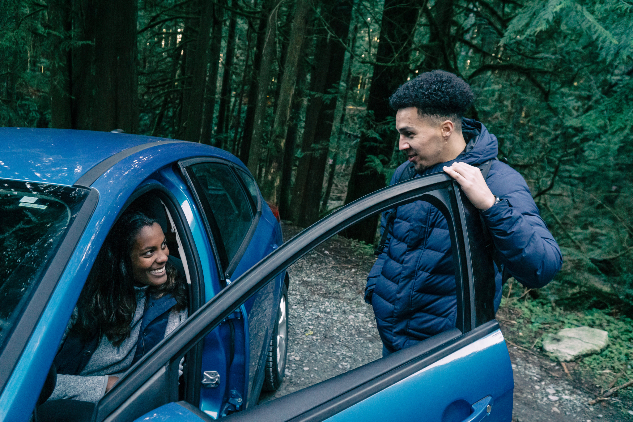 photo-by-pnw-production Two friends in electric vehicle